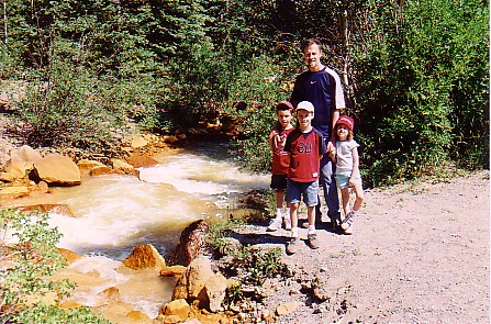 Ouray trip 05 family beside red mtn creek.jpg